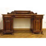 A Victorian mahogany breakfront twin-pedestal sideboard,