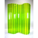 A Tom Dixon translucent green partition/screen constructed of slotted extruded plastic slats,