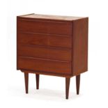 A 1960's teak chest of four drawers with turned handles on beech circular legs, of Danish design, w.