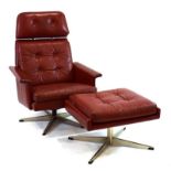 A 1970's red leather button upholstered armchair with a five-star swivel base and a matching