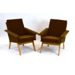 A pair of 1960's Czech armchairs with green striped upholstery and angular beech tapering legs