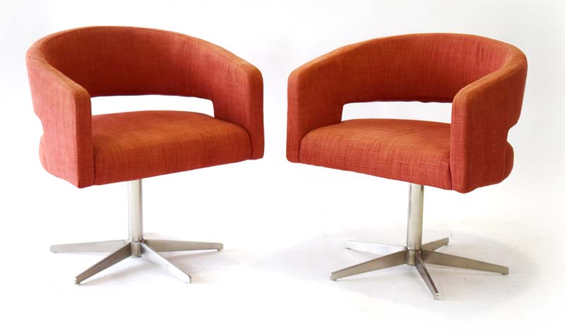 A pair of contemporary Swedish swivel chairs upholstered in pale red cotton on metal five-star - Image 3 of 10