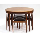 Hans Olsen for Frem Rojle, a Danish teak nesting suite including a circular table, d.