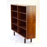 A 1960's Danish rosewood open-fronted bookcase, with six half-width adjustable shelves,