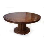A 1970's circular crossbanded centre table constructed of Indian rosewood,