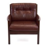 A 1970's brown vinyl button upholstered armchair with a stained beech frame