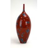 Matt Horne, a porcelain vase of tall bulbous form decorated in a red crystalline glaze, h.