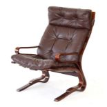 A 1970's Norwegian brown leather 'Skyline' armchair with a bentwood frame and brown leather