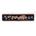 A 1970's Danish blue enamelled wall plaque relief decorated with flowers, by Soholm,