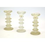 Timo Sarpeneva for Iitala, a set of three Finish moulded glass candlesticks, h.