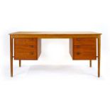 Attributed to Borge Mogensen, a 1960's Danish teak and crossbanded desk,