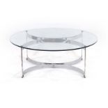 An occasional table by William Plunkett, the circular glass top resting on a chrome base, d.