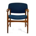 A 1960's Fritz Hansen oak elbow chair with blue fabric upholstery,