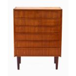 A 1970's teak chest of six drawers with curved handles, on turned legs, w.