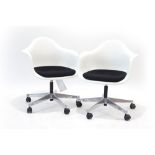 Charles and Ray Eames for Vitra, a pair of 'Eames Plastic Chair' with white moulded shells,