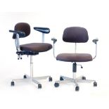 A pair of Danish adjustable office armchairs on five-star swivel bases with castors,