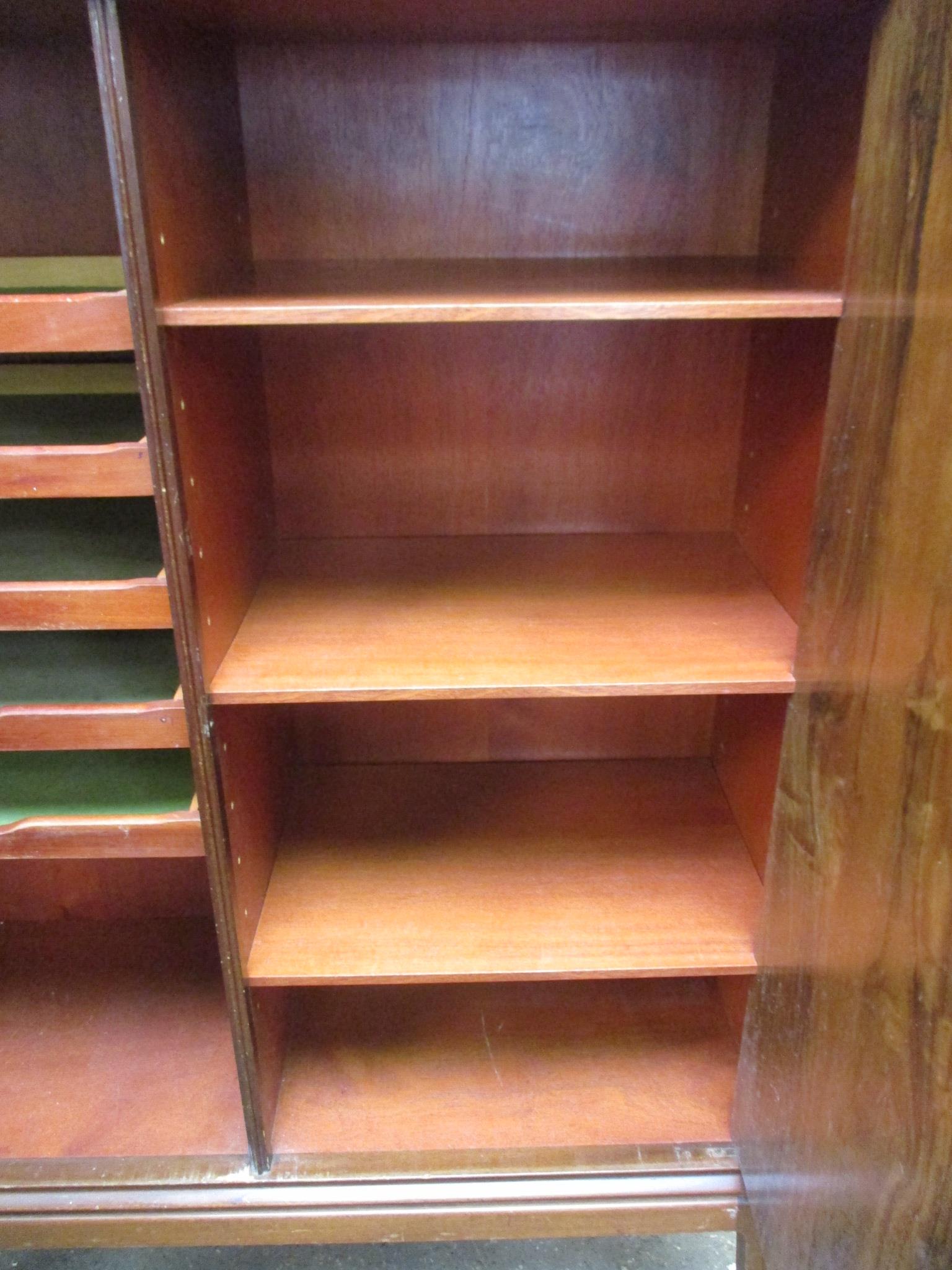 A 1960's walnut finished cabinet, the two doors enclosing shelves and trays, - Image 3 of 16