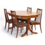 A set of four G-Plan teak and upholstered dining chairs together with a teak and crossbanded