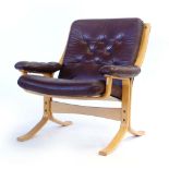A 1960/70's beech bentwood and brown leather button upholstered lounge armchair