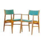 A pair of 1970's beech and upholstered elbow chairs CONDITION REPORT: Structurally