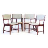 A set of four 1960's mahogany and upholstered elbow chairs