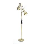 A 1970's brass finished twin-spot standard lamp CONDITION REPORT: Working order