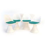 A set of four 1960's Arkana white moulded chairs on tulip-type bases CONDITION REPORT: