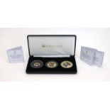 A cased set of three The Royal Wedding Photographic 22ct gold proof coins including a £5, £2 and £1,