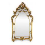 A 20th century wall mirror with moulded gilt frame and swag pediment,