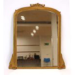 An overmantle mirror, the glazed plate in a giltwood frame,