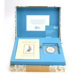 The Royal Mint limited edition 'The Tale of Peter Rabbit Coin and Book Gift Box' including a 22ct