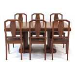 A 1930's Continental dining suite, loosely in the Art Deco manner,