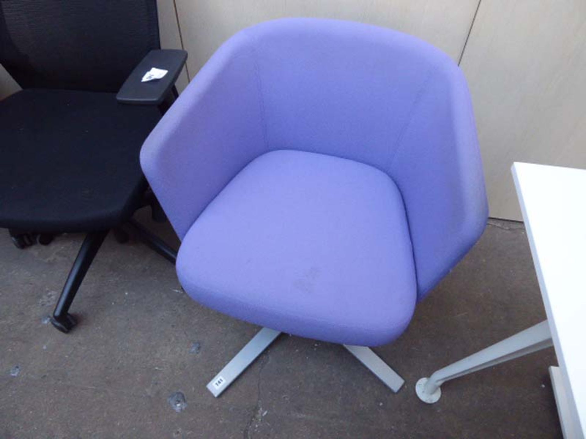 A purple tub chair