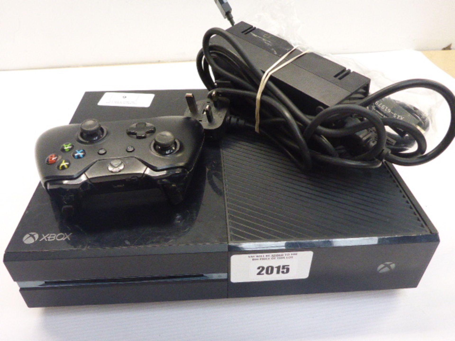 Microsoft Xbox One console with Controller and power supply.