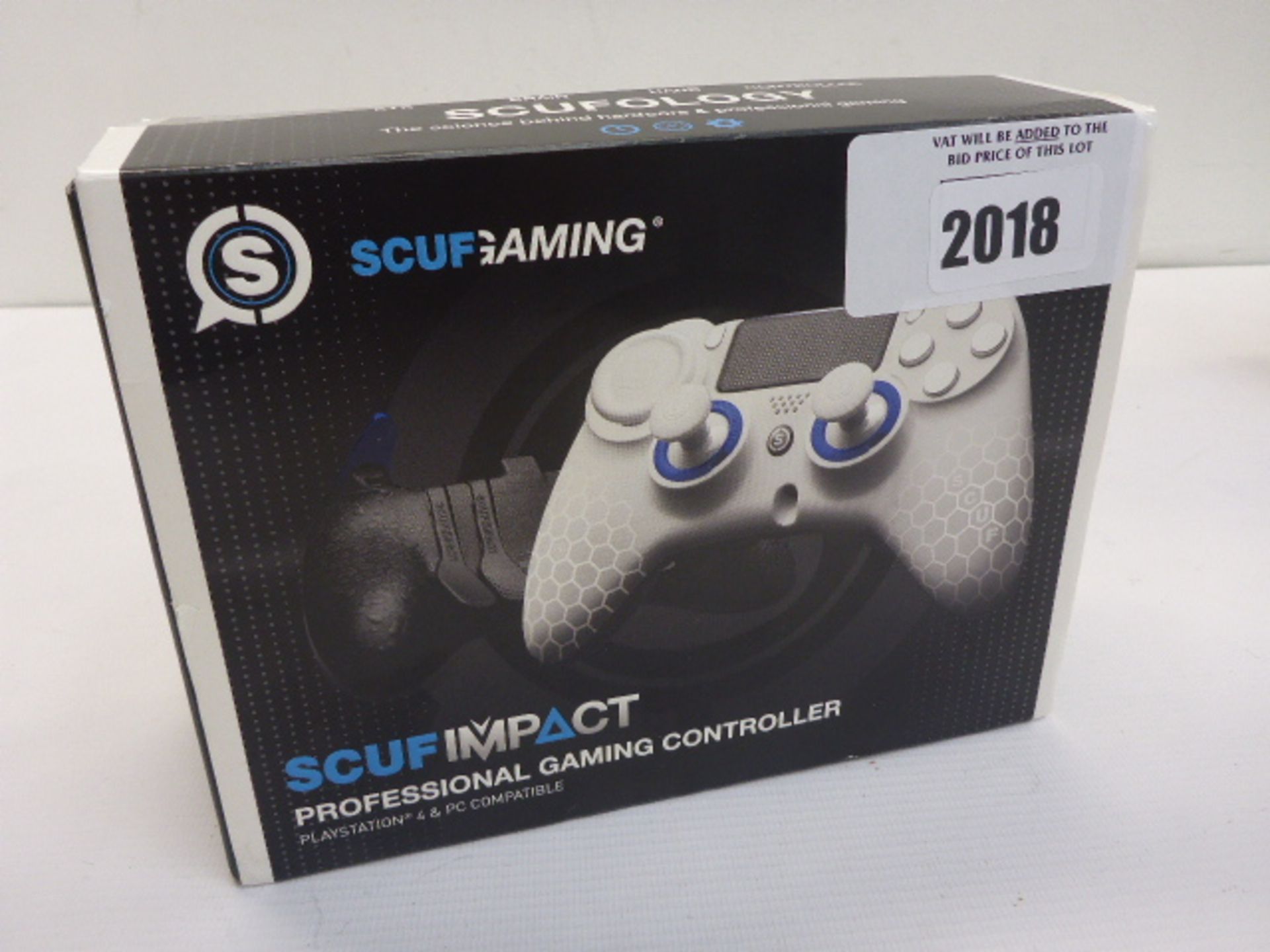 Scuf Impact Playstation 4 And PC compatible controller, Upgraded triggers, and custom skin design.