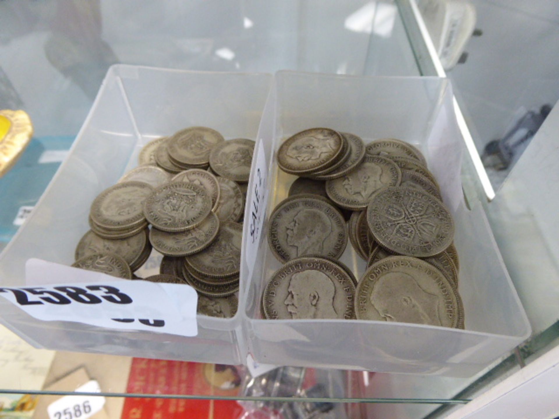 2653 Two trays of mixed early-GB coinage to include florins and one shilling pieces