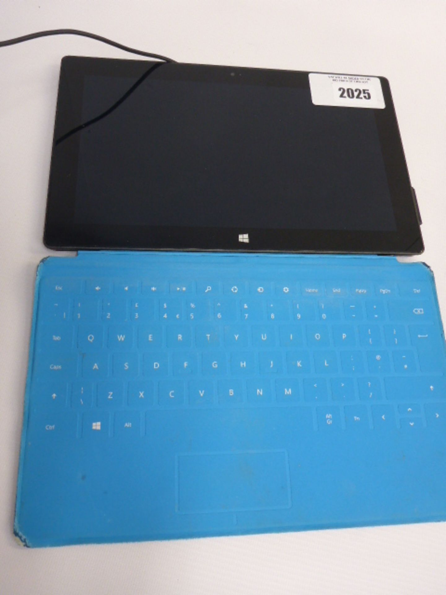 Microsoft Surface RT tablet, Tegra 3 cpu, 2 GB ram, 32GB storage. Comes with touch cover and PSU