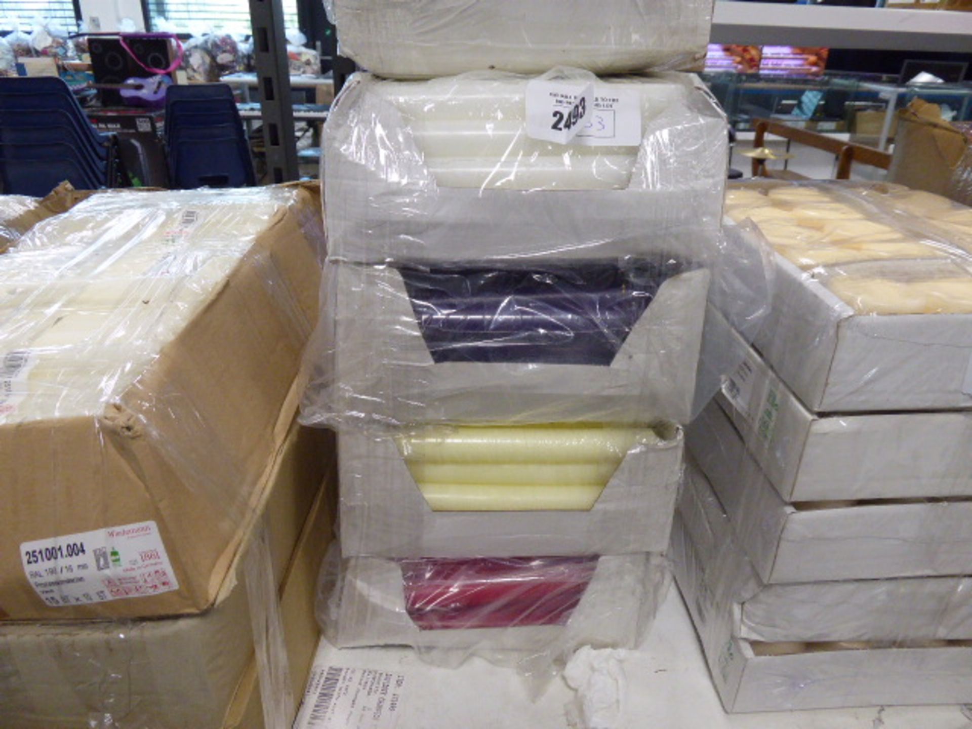 4 boxes of various mixed coloured candles in red, ivory, purple and white