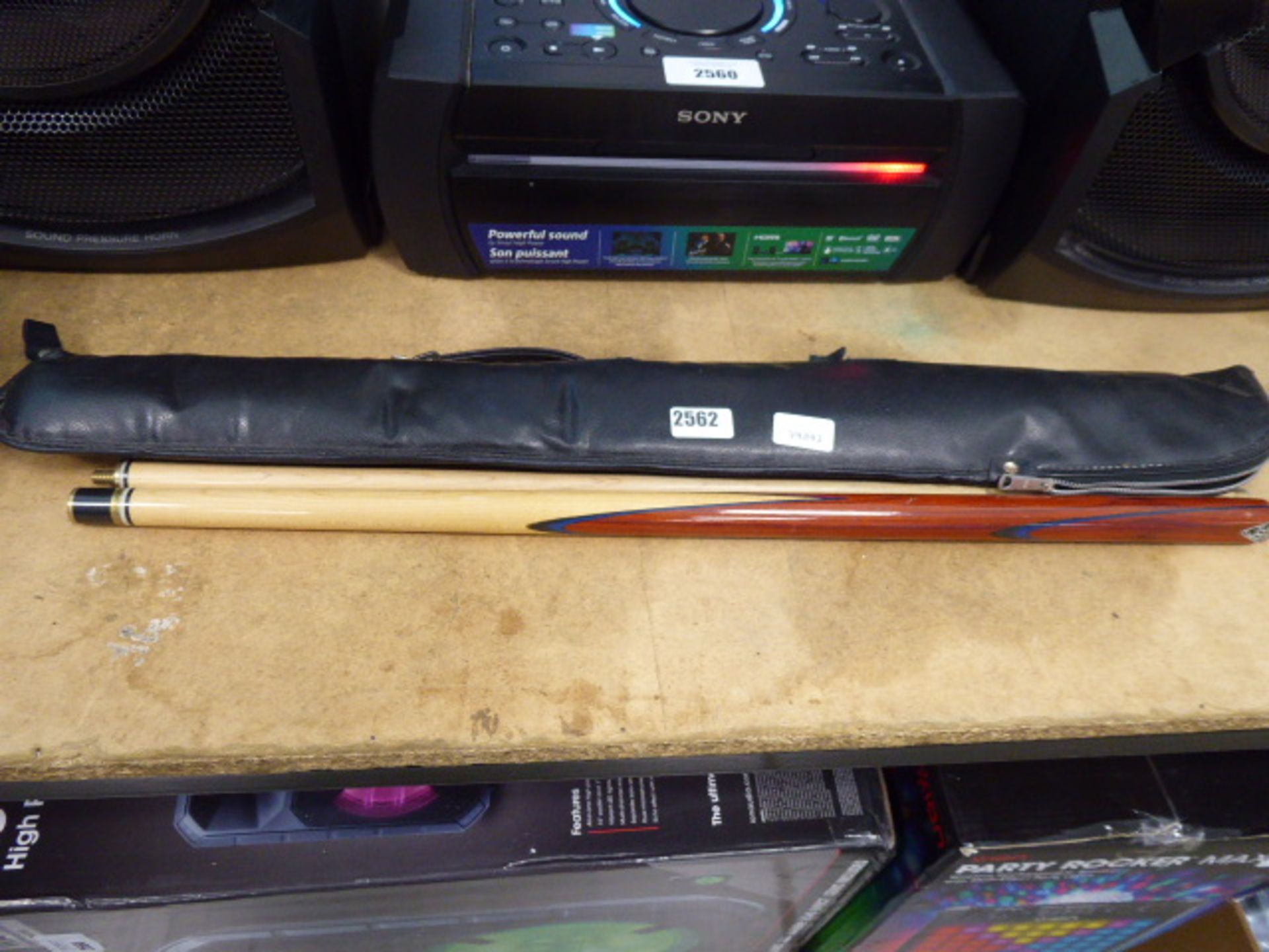 A BCE snooker cue with leather case