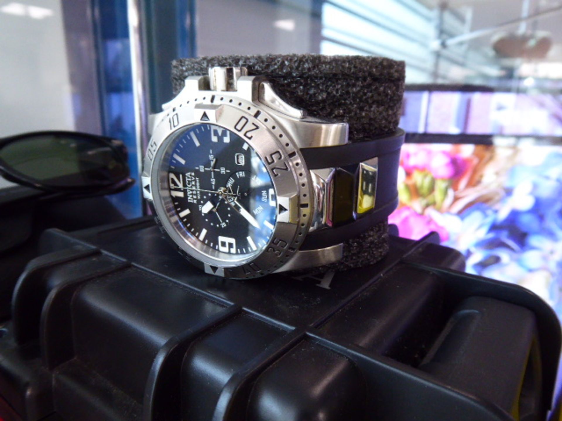 A gents Oversized Invicta Reserve wristwatch with rubberized strap and case