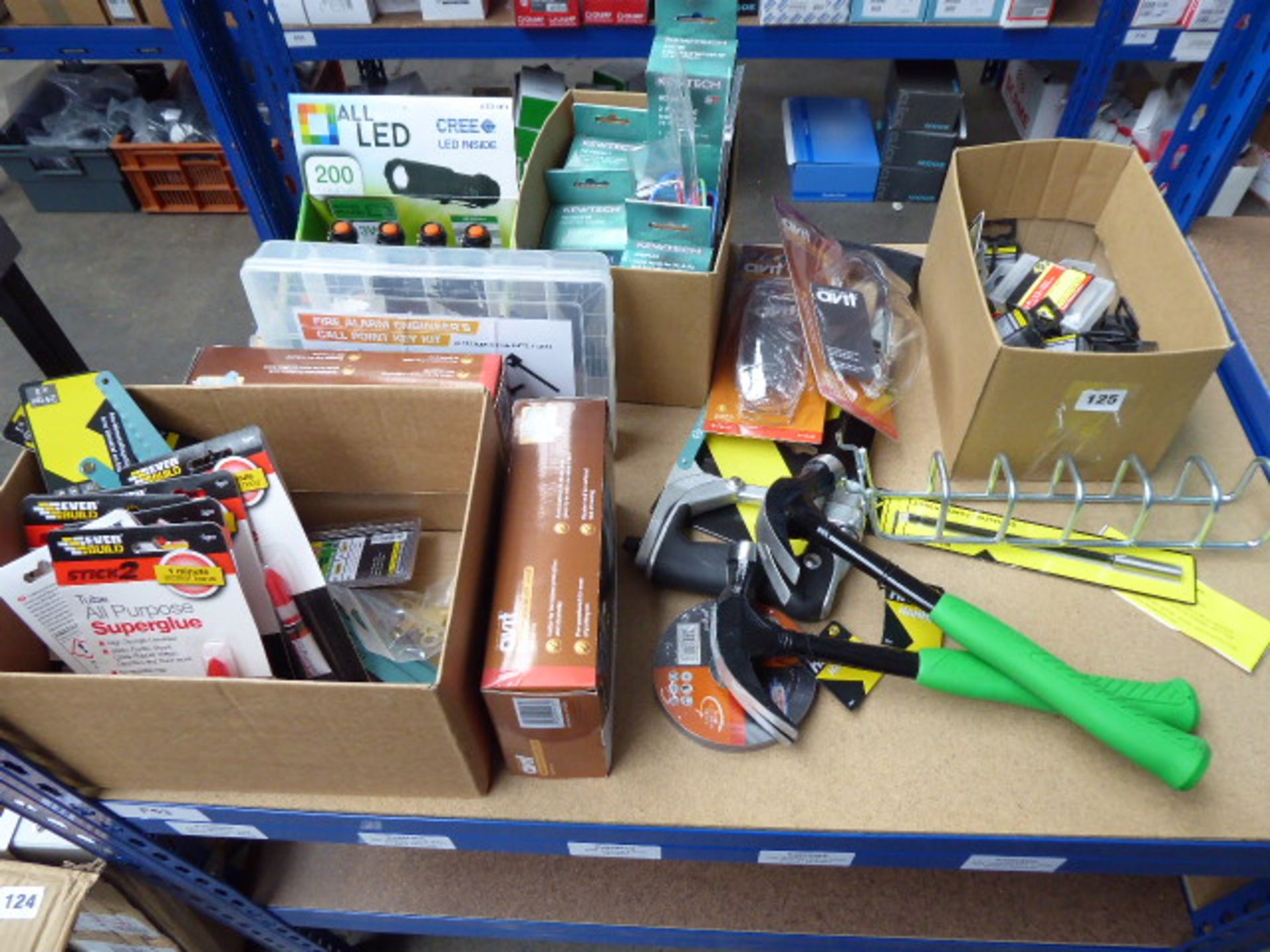 A range of hand tools and sundries including claw hammers, hacksaws, grinding discs, torches,