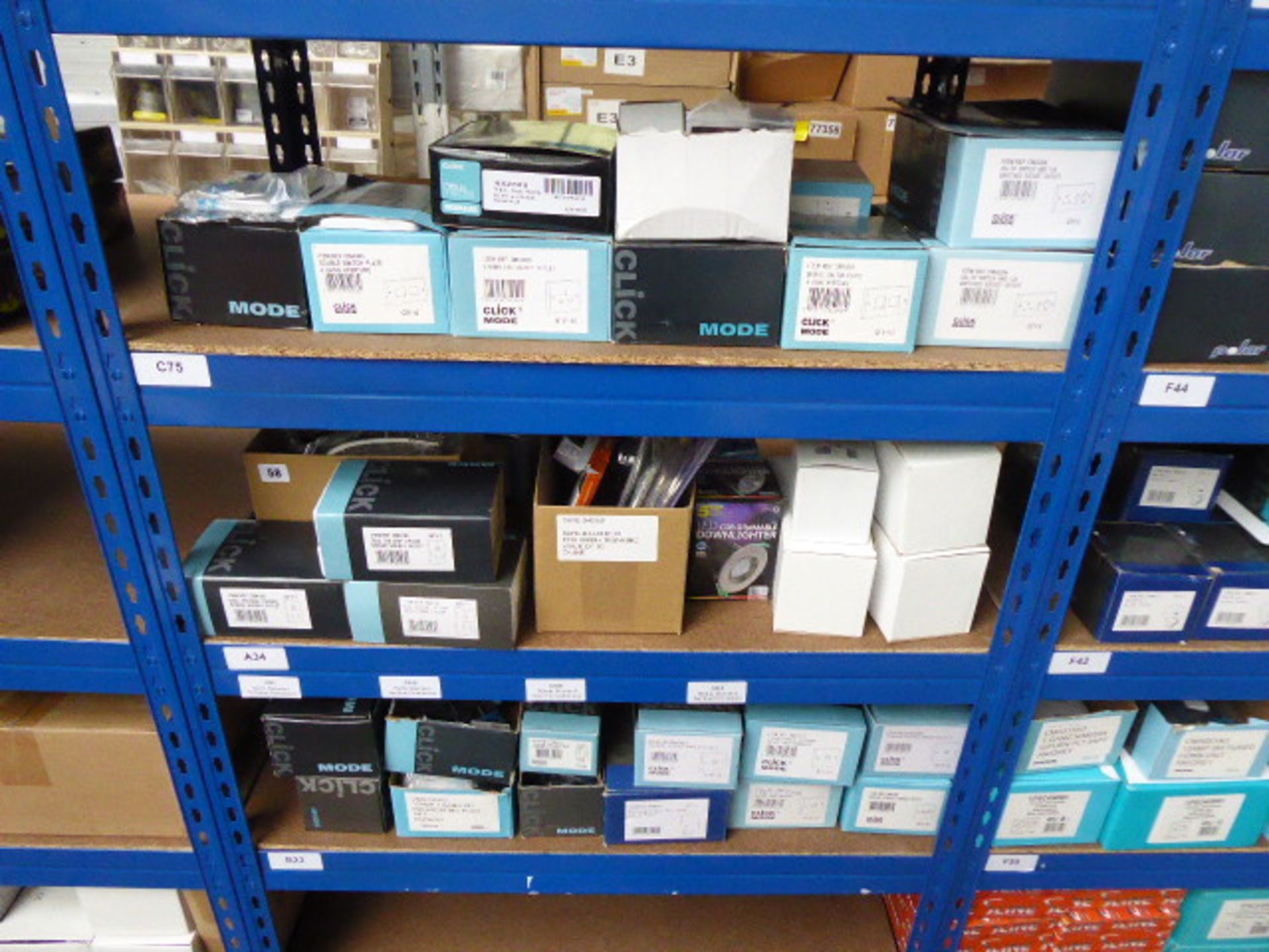 Approximately 32 boxes of Click Mode and other electrical components including switch plates,