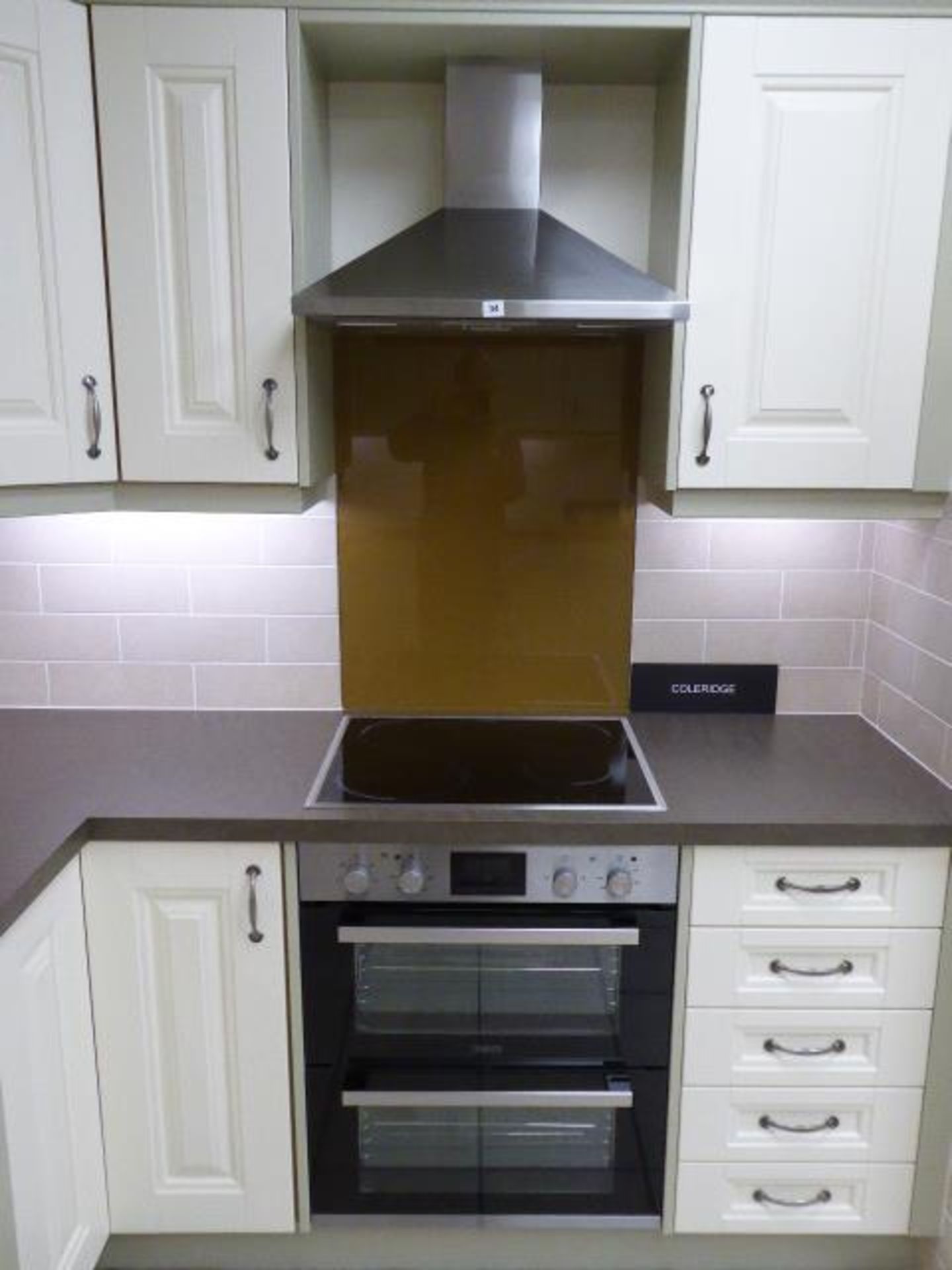 Zanussi ZOF35661XK double oven, Zanussi induction hob and an Electrolux EFC60151X chimney hood (