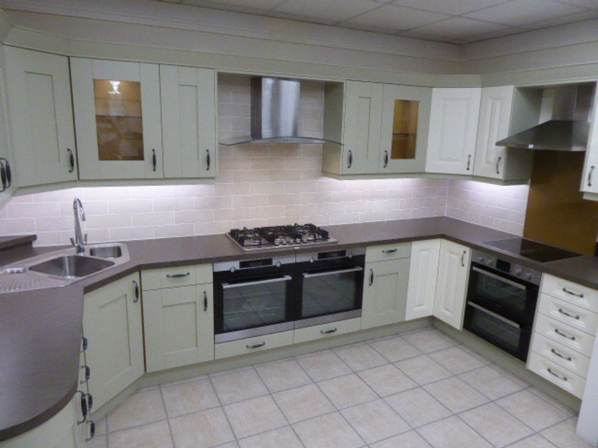 Coleridge and Milbourne sage kitchen with sand stone effect laminate worktops. Max measurement is