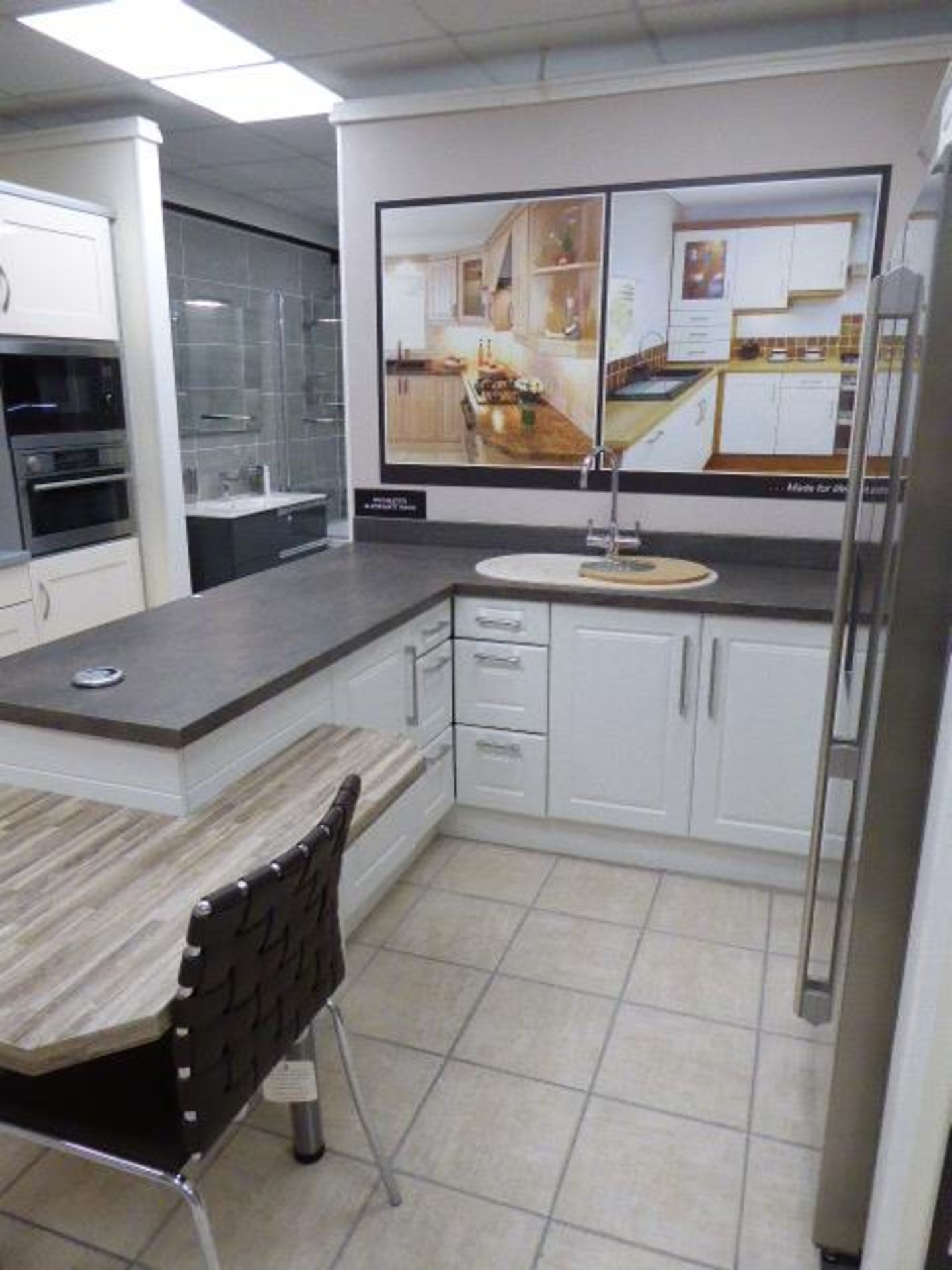 Rochester Alkor matte white kitchen with sand stone effect laminate worktops and block wood effect - Image 2 of 7