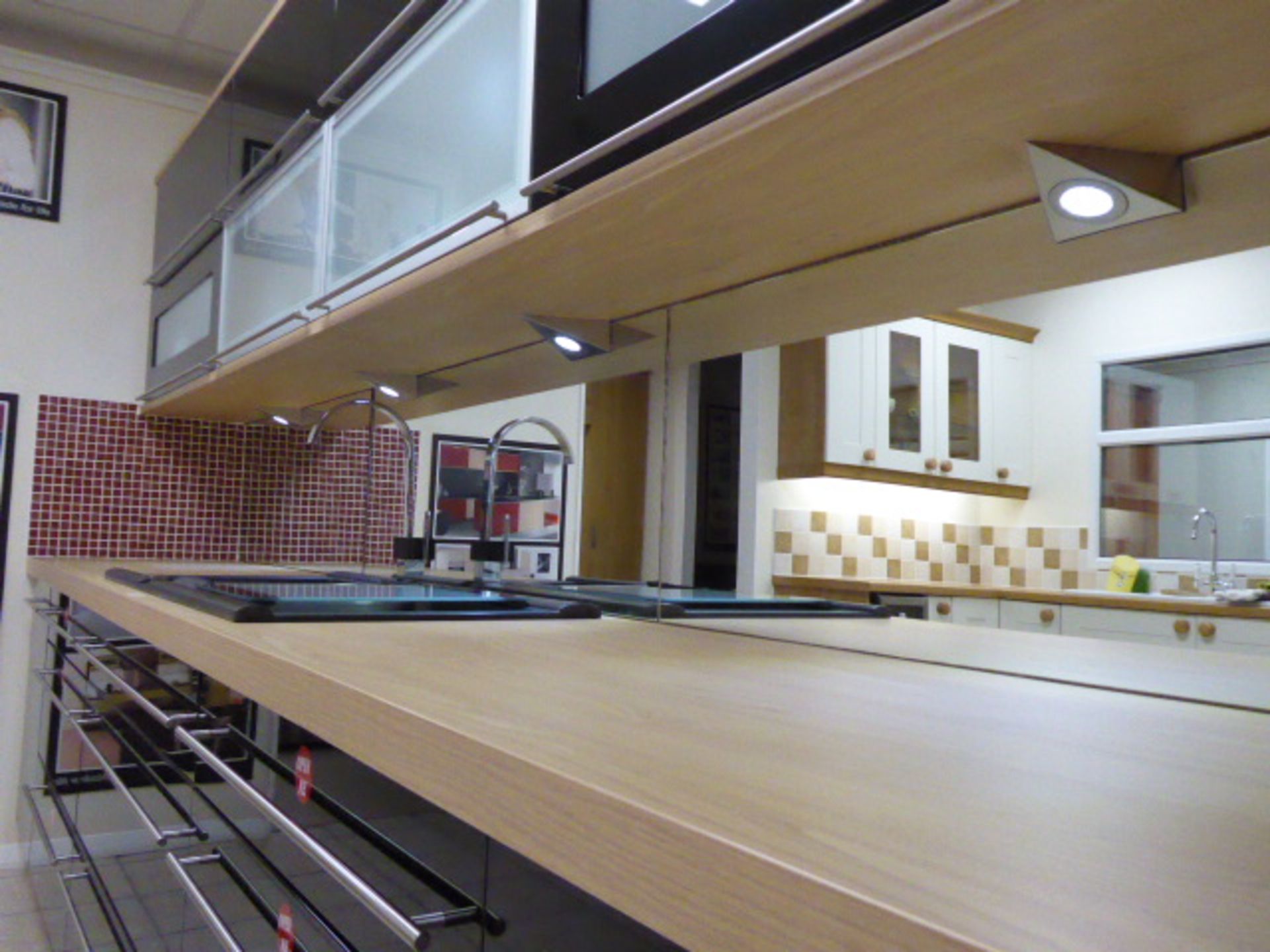 Alto gloss black galley kitchen measuring 370cm long with light oak wood laminate worktops. With a 1 - Image 11 of 12