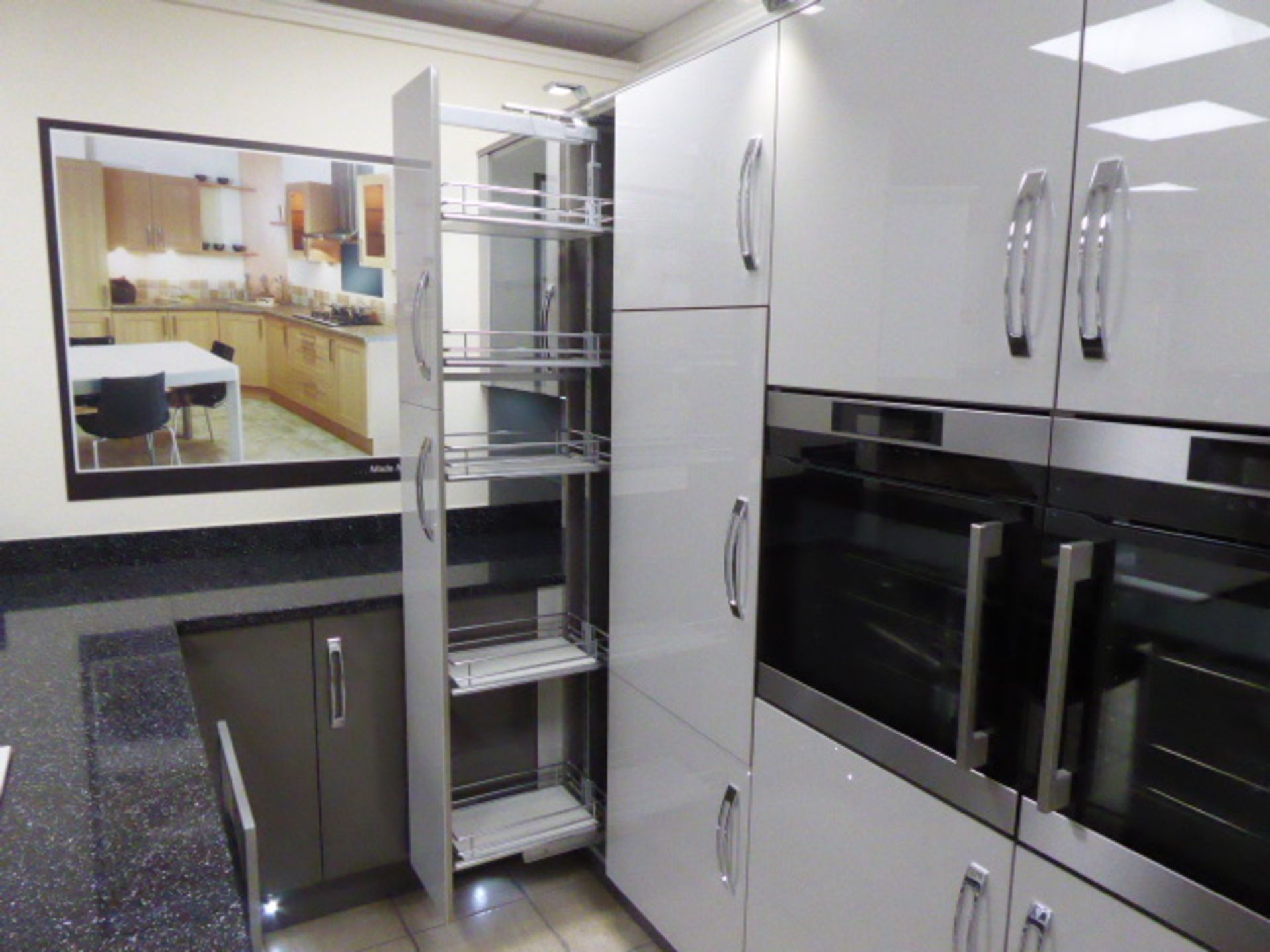 Large Roma dark grey and light grey kitchen with quartz worktops in an L-shape with a breakfast - Image 27 of 33