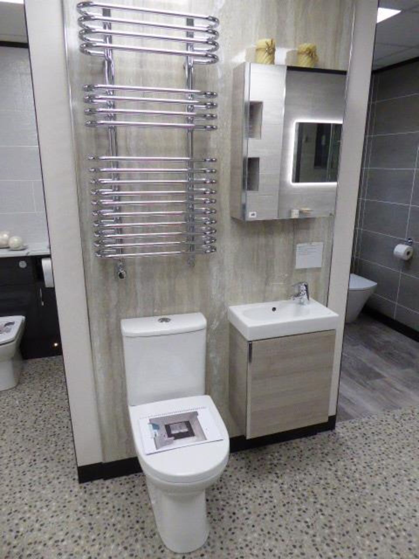 Roca Colina wash closet suite including: Mini Pack basin and base unit; Victoria body basin mixer;