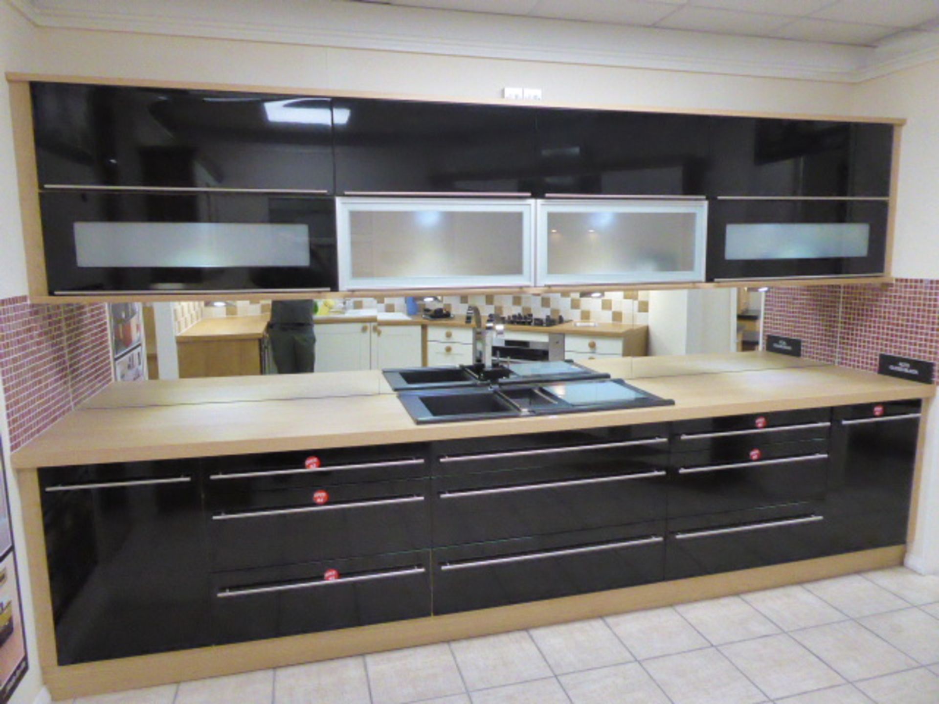 Alto gloss black galley kitchen measuring 370cm long with light oak wood laminate worktops. With a 1 - Image 2 of 12