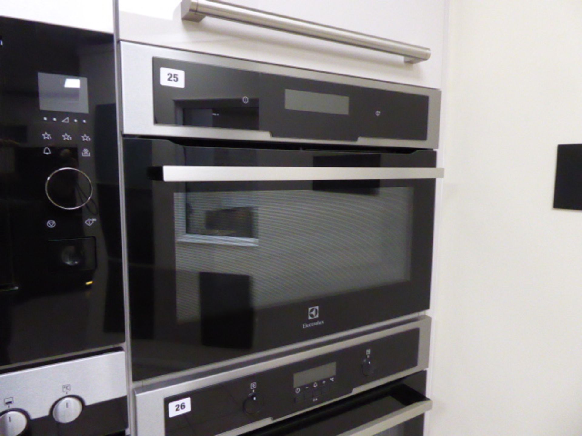 Electrolux EVY7800AX combination microwave with drop down door (Located at the Lincoln saleroom)